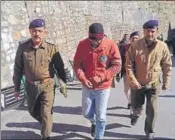  ?? DEEPAK SANSTA/HT ?? Police personnel after producing the accused in court in Shimla on Monday. His custody has been extended till December 9.
