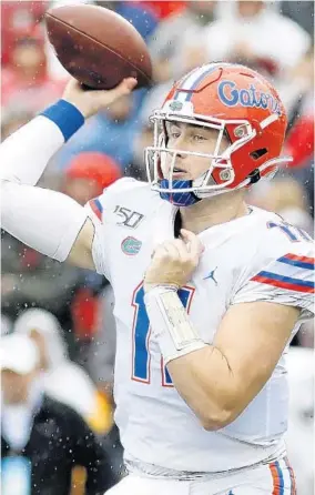  ?? MIC SMITH/AP ?? UF quarterbac­k Kyle Trask throws the ball against South Carolina in the second half Oct. 19 in Columbia, S.C. Florida defeated South Carolina 38-27. Trask will face his biggest test Saturday.