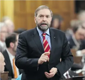  ?? FRED CHARTRAND/THE Canadian Press ?? NDP Leader Thomas Mulcair saw one of his MPs bolt for the Bloc Quebecois on Thursday.