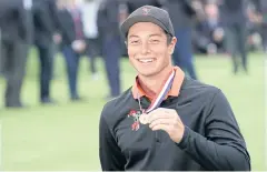  ?? AP ?? Viktor Hovland poses with the low amateur medal.