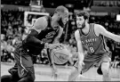  ?? MARK D. SMITH / USA TODAY SPORTS ?? LeBron James of the Cleveland Cavaliers dribbles in front of Oklahoma City’s Alex Abrines during Tuesday’s game in OKC, where the Cavs beat the Thunder 120-112.