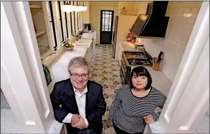  ?? Photos by Arkansas Democrat-Gazette/ JOHN SYKES JR. ?? Tanya Rollins and Kevin Keech stand in the kitchen (right) of the historic Theo Sanders House, on which they did extensive renovation­s to restore it to its former glory. The house is among those to be open to visitors during the Quapaw Quarter...