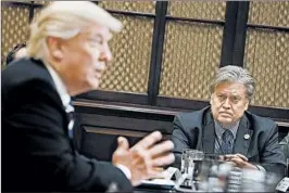  ?? EVAN VUCCI/AP ?? White House aide Steve Bannon listens as President Donald Trump speaks during a meeting on cybersecur­ity in January 2017. Despite Bannon’s role, Trump fired him in August.