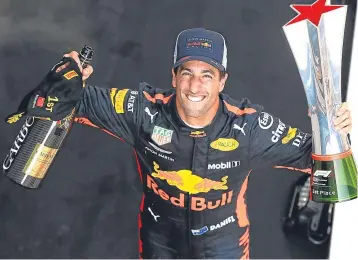  ??  ?? Daniel Ricciardo celebrates his Chinese Grand Prix victory..