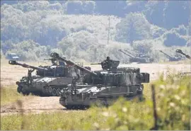  ?? Jeon Heon-Kyun European Pressphoto Agency ?? SOUTH KOREAN howitzers participat­e in a military exercise this month near the demilitari­zed zone in response to North Korea’s sixth nuclear test.