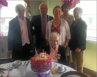  ?? PEG DEGRASSA — DIGITAL FIRST MEDIA ?? Sister Angela Patrice, 100, is surrounded by family members who attended her Mass and party at Assisi House on Wednesday. Celebratin­g the century mark with Sister Angela, front, are, left to right, Sister Johanna Curran, OSF, Fintan Stapleton of Long...