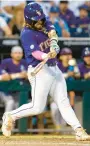  ?? JOHN PETERSON/AP ?? LSU’s Tommy White hits a game-winning home run against Wake Forest in the 11th inning Thursday night.