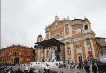  ?? ANTONIO CALANNI — THE ASSOCIATED PRESS ?? Pope Francis, seen on the stage, celebrates an open-air Mass in Carpi, northern Italy, for a one-day pastoral visit to Carpi and Mirandola, Sunday. Francis has arrived in the northern Emilia Romagna region hit by deadly quakes in 2012 on a visit meant...