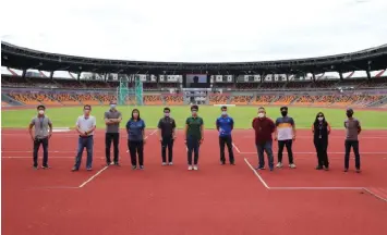  ?? (BCDA) ?? CONTINGENT. A contingent from the National Academy of Sports led by Executive Director Prof. Josephine Joy Reyes, and the Department of Education visit the New Clark City Athletics Stadium on December 4, Friday. The stadium is one of the sports facilities to be used by NAS when it opens next year.