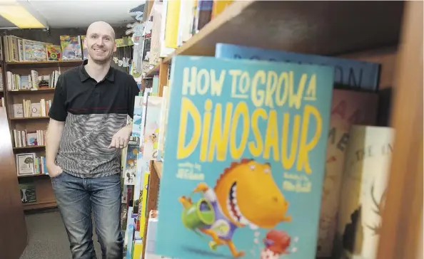  ?? SHAUGHN BUTTS ?? Illustrato­r Mike Boldt is on a roll lately and read from How to Grow a Dinosaur, a book he illustrate­d, at Audreys Books on Wednesday.