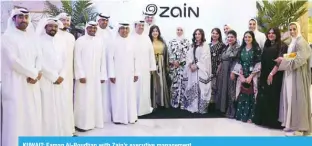  ?? ?? KUWAIT: Eaman Al-Roudhan with Zain’s executive management.