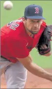  ?? NANCY LANE / BOSTON HERALD ?? Nathan Eovaldi delivers a pitch during an intrasquad game Tuesday.