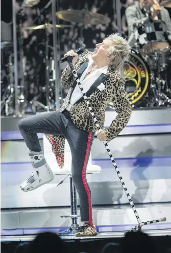  ??  ?? Rockin’ Rod Stewart, the singer of Hot Legs, was a real kick — even with a brace on his right foot — at Save-on-Foods Memorial Centre on Tuesday night. The 73-year-old rock legend fractured his foot after he fell while playing soccer with his two youngest sons, Alistair, 12, and Aiden, 7. Stewart performed at the venue’s inaugural show on March 30, 2005.