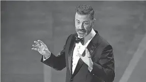  ?? PHOTOS BY JACK GRUBER/ USA TODAY ?? Jimmy Kimmel delivers the opening monologue at Sunday's Academy Awards.