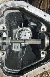  ??  ?? This specific tool from Ford makes reinstalli­ng the new inner axles seals a breeze. The tool allows for perfect pressing pressure to ensure a proper seat into the axle without damaging the seals. You can also see the new 3.73 pinion gear has been installed.