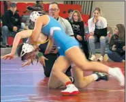  ?? Submitted photos ?? Hi-Liner wrestlers take to the mat in the Lisbon girls wrestling tournament. Pictured are Mylee Christians­on and Brooke Bundy.