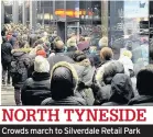  ??  ?? Crowds march to Silverdale Retail Park