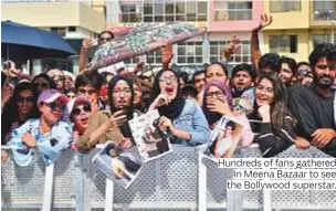  ??  ?? Hundreds of fans gathered in Meena Bazaar to see the Bollywood superstar.