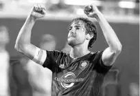  ?? CHARLES KING/ORLANDO SENTINEL ?? Orlando City captain Kaká acknowledg­es the fans after scoring a game-winning penalty kick during the Lions 3-2 win over Toronto FC on June 25, 2016, at Camping World Stadium.