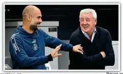  ?? GETTY IMAGES ?? You can’t touch us: Guardiola and Bruce share a joke on the touchline