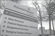  ?? John Bailey ?? New signage for AdventHeal­th Redmond is up at the hospital on Redmond Road in Rome following the $635 million sale from Nashville-based HCA to Florida-based AdventHeal­th.