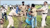  ??  ?? Cops thrash a Dalit family during an anti-encroachme­nt drive in Guna district, Madhya Pradesh. —ANI