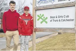  ?? LYNN CURWIN/TRURO NEWS ?? Jack Mcquaid, left, and Owen Carr are two of the young people who’ve benefitted from the Raise the Grade program. Not only have their grades improved, but they’ve learned things about bank accounts, credit cards and other financial areas of life.