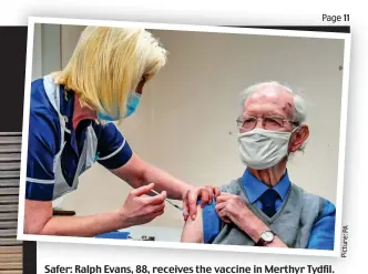  ?? Picture: ?? Safer: Ralph Evans, 88, receives the vaccine in Merthyr Tydfil. He is among the 1.5million to have been given the NHS jab