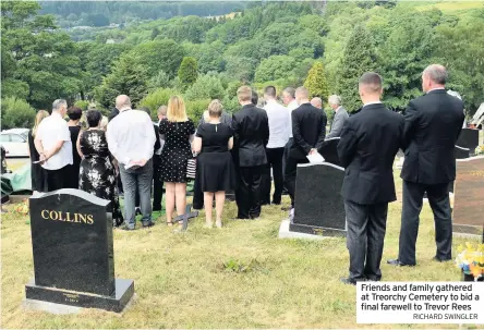  ?? RICHARD SWINGLER ?? Friends and family gathered at Treorchy Cemetery to bid a final farewell to Trevor Rees