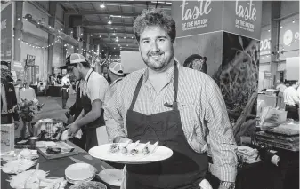  ?? Photos by Gary Fountain / Contributo­r ?? Chef Drake Leonards serves crispy fried oysters at Taste of the Nation.