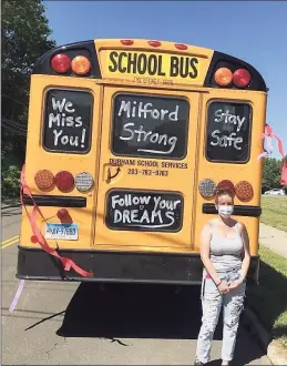  ?? Bill Bloxsom / Hearst Connecticu­t Media ?? Crystal Zimmerman prepares to make one last run before COVID-19 closed Milford schools last March.