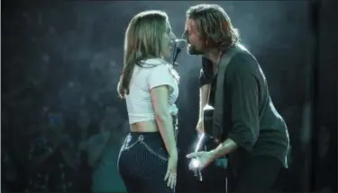  ?? WARNER BROS. PICTURES ?? Lady Gaga and Bradley Cooper star in a new version of “A Star Is Born,” which will mark Cooper’s directoria­l debut.