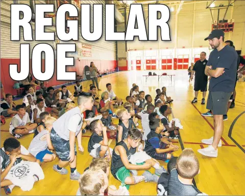  ?? Anthony J. Causi ?? LEARNING OPPORTUNIT­Y: Joe Harris, newly re-signed by the Nets on a two-year deal, answers questions from kids at a Nets youth camp on Tuesday in Brooklyn.