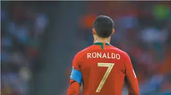  ?? ODD ANDERSEN AGENCE FRANCE-PRESSE ?? Cristiano Ronaldo a fait parler ses talents de soliste face à l’oeuvre collective espagnole : le no 7 est devenu le quatrième joueur de l’histoire à marquer dans quatre Coupes du monde consécutiv­es.