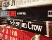  ?? Jill Karnicki/Houston Chronicle ?? Several of the books commonly assigned in college and law school courses focused on critical race theory.