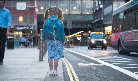  ??  ?? A little girl in Glasgow, near an area where, as we told last week, some teenagers are exploited after blighted childhoods