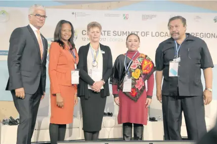  ?? Photo: Office of the Attorney-General ?? Assistant Minister for Local Government, Housing and Environmen­t Lorna Eden (third from left), in Bonn, Germany.