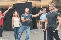  ?? TAYLOR LONG CANADIAN OPERA COMPANY ?? Cast members rehearse for the new Canadian Opera Company production of “Turandot,” which celebrates the strong princess.