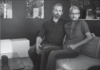  ?? NICK COTE / THE NEW YORK TIMES ?? A baker refused to bake a wedding cake for Charlie Craig, left, and David Mullins, shown Aug. 24 at home in Denver. The case, pitting free speech vs. discrimina­tion, is to be heard next month by the Supreme Court.