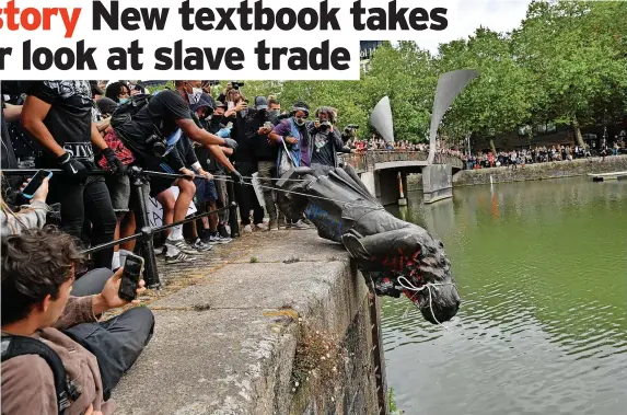  ?? BEN BIRCHALL/PA WIRE ?? Colston’s statue goes into the floating harbour, June 7 2020. Colston’s fall after years of argument prompted a group of Bristol history teachers to research and write a new school textbook