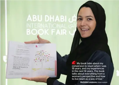  ?? Photo by Ryan Lim ?? Mathilde Loujayne with her book Big Little Steps at the Abu Dhabi Internatio­nal Book Fair. —