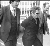  ?? Review Journal File ?? Jerald Burgess is escorted into court in 1982. He was found not guilty in February 1982 in the kidnapping case.