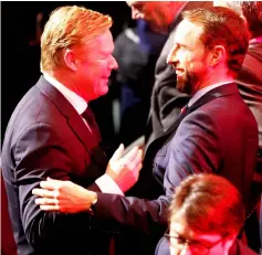  ?? — Reuters photo ?? Netherland­s coach Ronald Koeman (left) and England manager Gareth Southgate after the draw at The Convention Centre, Dublin, Ireland.