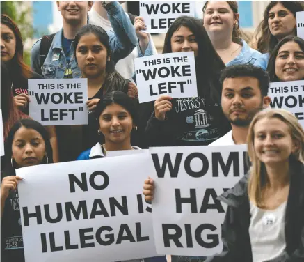  ?? ALLISON JOYCE / AFP VIA GETTY IMAGES FILES ?? We need more women to demonstrat­e the courage of their conviction­s — and denounce the destructiv­e,
far-left dogma of wokeness that is running roughshod over Canadians, Amy Hamm says.