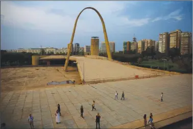  ?? (File Photo/AP/Hassan Ammar) ?? Visitors tour on Oct. 20, 2018, The Open Air Theater, designed in the early 1960s by the late Brazilian architect Oscar Niemeyer, at the Rachid Karami Internatio­nal Fair in Tripoli, Lebanon.