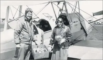  ??  ?? Violet Hibbard about to re-enact the first flight with Hastings Tiger Moth pilot John Mackie in October 1970