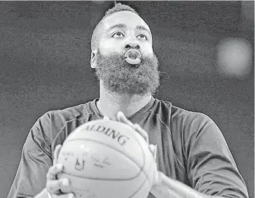  ?? James Nielsen photos / Houston Chronicle ?? Rockets guard James Harden has a knack for staying focused under pressure, as evidenced by his scoring 17 of his 28 points over the final 18 minutes in Tuesday night’s 110-106 loss to the Warriors.