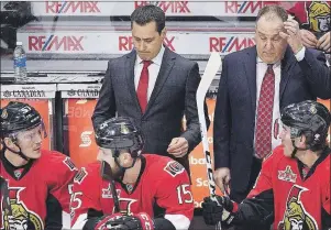  ?? CP PHOTO ?? Ottawa Senators head coach Guy Boucher, left, and assistant coach Martin Raymond react to a penalty during the first period the first round of Stanley Cup playoff action against the Boston Bruins, in Ottawa on Wednesday.