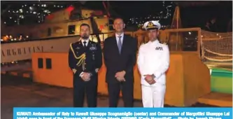  ??  ?? KUWAIT: Ambassador of Italy to Kuwait Giuseppe Scognamigl­io (center) and Commander of Margottini Giuseppe Lai (right) pose in front of the European Multi Mission Frigate (FREMM) “Carlo Margottini”. —Photo by Joseph Shagra