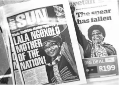  ??  ?? First pages of South African newspapers the day after the death of Winnie Mandela, in Johannesbu­rg. — AFP photo